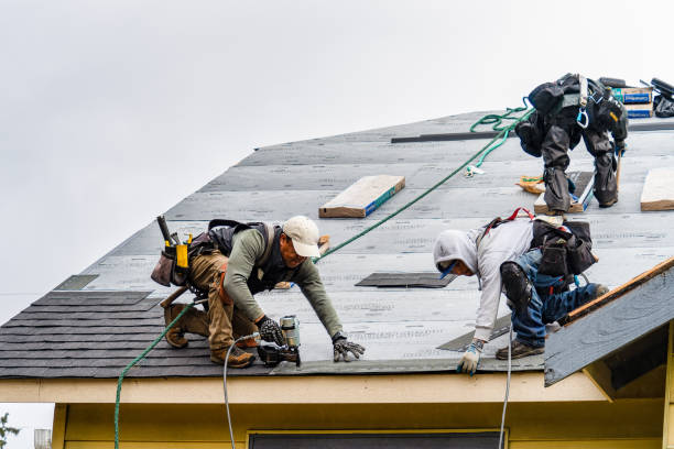 Professional Gutter Installation technician working in Jamaica, VT